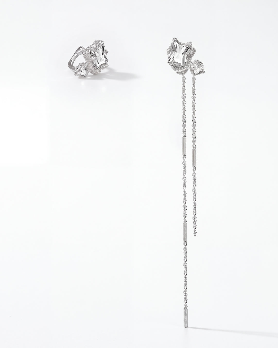 Tether Asymmetrical Earrings in platinum silver
